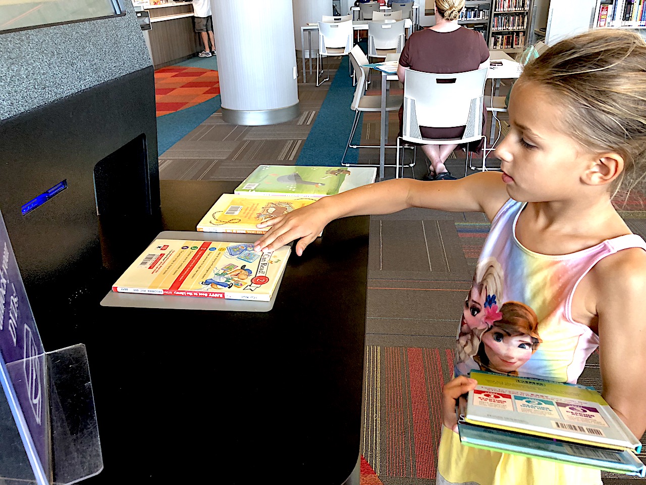 Take your child to the library to give her a love for reading
