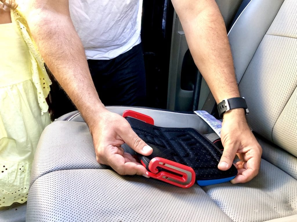 Mifold Grab and Go Booster - A Must-Have For Family Travel | Travel car seat | Travel booster | Family travel tips | Mifold car seat | #familytravel #mifold #travelcarseat #travelbooster #boosterseat