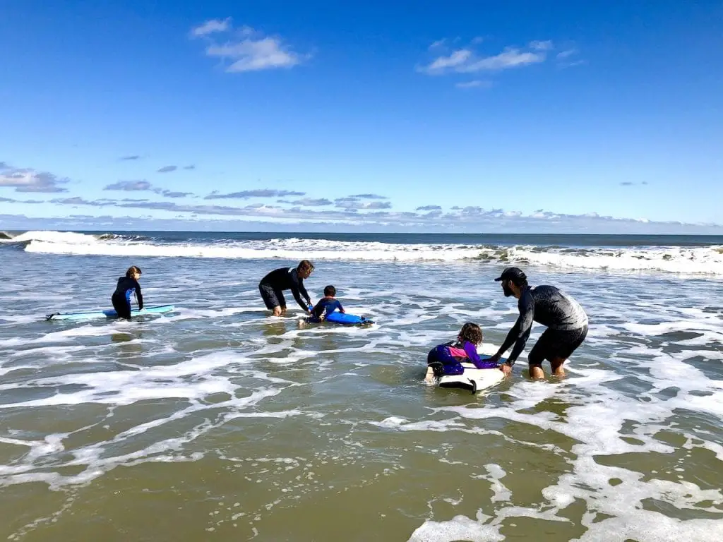 Family Surf Lesson In Jacksonville, FL | What to expect in surf lesson | Private surf lesson | Jacksonville Surf and Paddle | Kids surf lesson | North Florida | Travel Blogger | Visit Jacksonville | #visitjacksonville #onlyinjax #jacksonvillesurfandpaddle #surflesson #familysurfing #surfsup #kidssurflesson