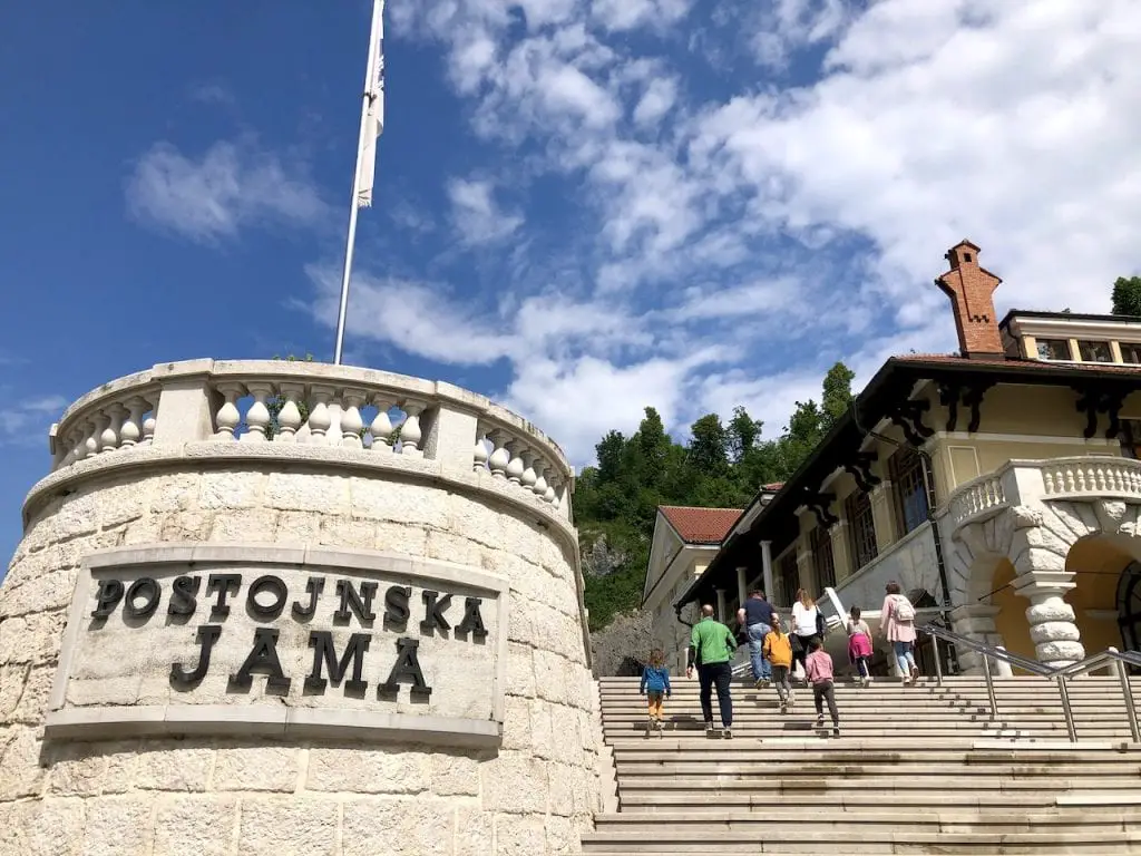 Mind-Blowing Day Trip From Ljubljana For Families - Postojnska Jama Caves | Postojna Cave | Slovenia travel | Slovenia with kids | Day trip from Ljubljana | Ljubljana, Slovenia | Visit Ljubljana | Best underground caves in Europe | Largest caves in Europe | Europe travel | Slovenia off the beaten path | Traveling with kids | Family travel in Slovenia | #slovenia #Postojnacave #ifeelslovenia #PostojnskaJama #hosted #predjamacastle #hoteljama