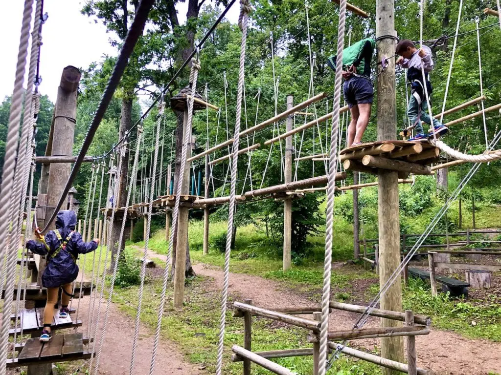 Sigulda Tarzan: Thrilling Family Day Trip Near Riga, Latvia | Adventure park in Latvia | Largest tree top obstacle course in the Baltics | Adventure park in the Baltics | Longest zip line in the Baltics | Zip lining Latvia | Riga road trips with kids | What to do in Riga with kids | #latvia #latviatravel #riga #baltictravel #adventurecourse #rigadaytrip #familytravel