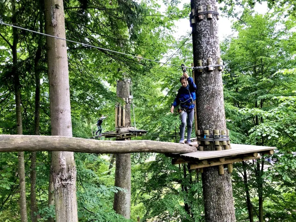 Sigulda Tarzan: Thrilling Family Day Trip Near Riga, Latvia | Adventure park in Latvia | Largest tree top obstacle course in the Baltics | Adventure park in the Baltics | Longest zip line in the Baltics | Zip lining Latvia | Riga road trips with kids | What to do in Riga with kids | #latvia #latviatravel #riga #baltictravel #adventurecourse #rigadaytrip #familytravel