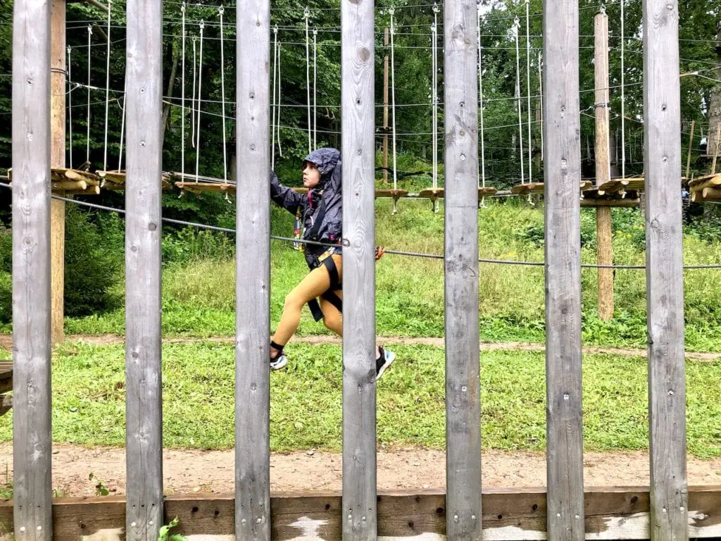 Sigulda Tarzan: Thrilling Family Day Trip Near Riga, Latvia | Adventure park in Latvia | Largest tree top obstacle course in the Baltics | Adventure park in the Baltics | Longest zip line in the Baltics | Zip lining Latvia | Riga road trips with kids | What to do in Riga with kids | #latvia #latviatravel #riga #baltictravel #adventurecourse #rigadaytrip #familytravel